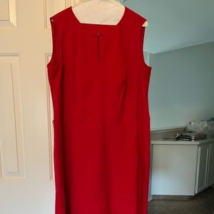 Calvin Klein Red A-line dress with clasp detailing at the neck line.